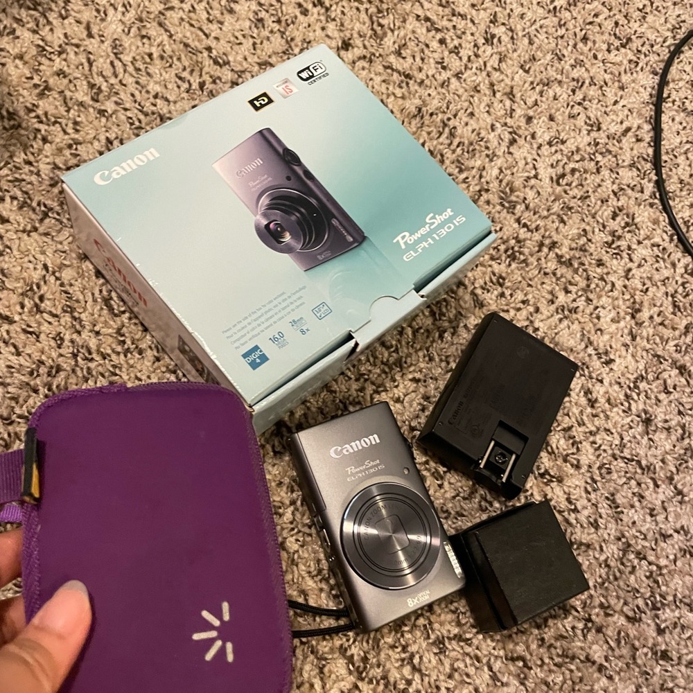 Canon PowerShot Silver Camera with Purple Case